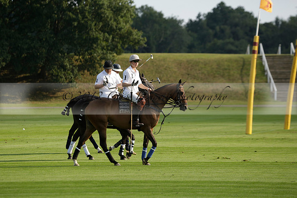 Pluma Negra (white) v Shoreline (black) in the Brecknock Cup Subsidiary final polo match played on Sunday 25 August 2013 at Cowdray Park Polo Club on Ambersham 1. 2013.10.12 www.polopictures.co.uk