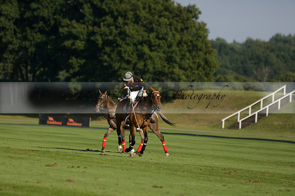 Pluma Negra (white) v Shoreline (black) in the Brecknock Cup Subsidiary final polo match played on Sunday 25 August 2013 at Cowdray Park Polo Club on Ambersham 1. 2013.10.12 www.polopictures.co.uk