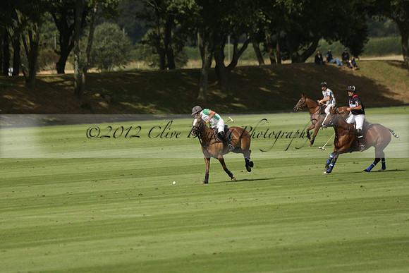 Jaeger Le Coultre (black)  v Wairakei Pastoral (white) in a Jaeger Le Coultre Holden White Cup polo match played on 29 July 2013 at Cowdray Park Polo Club on Brooksfieldwww.polopictures.co.uk