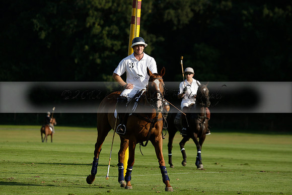 Pluma Negra (white) v Shoreline (black) in the Brecknock Cup Subsidiary final polo match played on Sunday 25 August 2013 at Cowdray Park Polo Club on Ambersham 1. 2013.10.12 www.polopictures.co.uk