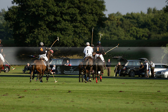 Pluma Negra (white) v Shoreline (black) in the Brecknock Cup Subsidiary final polo match played on Sunday 25 August 2013 at Cowdray Park Polo Club on Ambersham 1. 2013.10.12 www.polopictures.co.uk