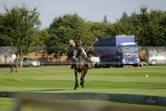 Pluma Negra (white) v Shoreline (black) in the Brecknock Cup Subsidiary final polo match played on Sunday 25 August 2013 at Cowdray Park Polo Club on Ambersham 1. 2013.10.12 www.polopictures.co.uk