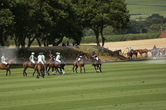 Jaeger Le Coultre (black)  v Wairakei Pastoral (white) in a Jaeger Le Coultre Holden White Cup polo match played on 29 July 2013 at Cowdray Park Polo Club on Brooksfieldwww.polopictures.co.uk
