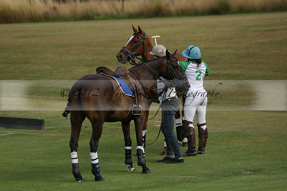 Jaeger Le Coultre (black)  v Wairakei Pastoral (white) in a Jaeger Le Coultre Holden White Cup polo match played on 29 July 2013 at Cowdray Park Polo Club on Brooksfieldwww.polopictures.co.uk