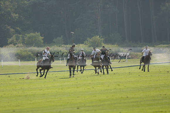 Pluma Negra (white) v Shoreline (black) in the Brecknock Cup Subsidiary final polo match played on Sunday 25 August 2013 at Cowdray Park Polo Club on Ambersham 1. 2013.10.12 www.polopictures.co.uk