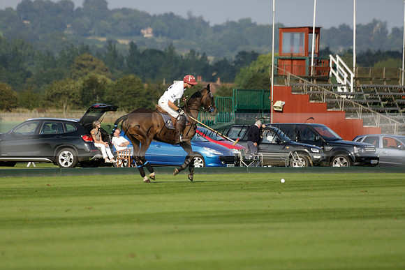 Pluma Negra (white) v Shoreline (black) in the Brecknock Cup Subsidiary final polo match played on Sunday 25 August 2013 at Cowdray Park Polo Club on Ambersham 1. 2013.10.12 www.polopictures.co.uk