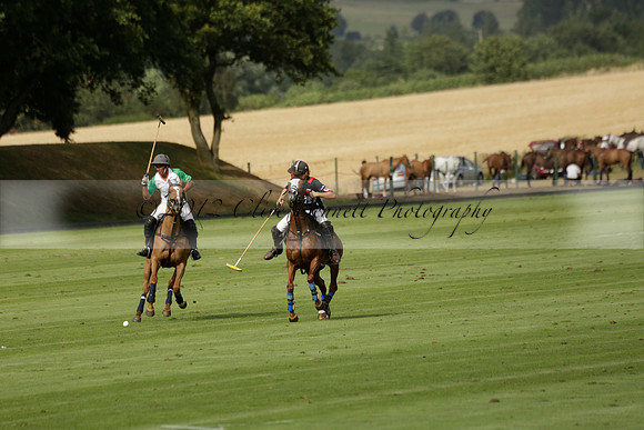 Jaeger Le Coultre (black)  v Wairakei Pastoral (white) in a Jaeger Le Coultre Holden White Cup polo match played on 29 July 2013 at Cowdray Park Polo Club on Brooksfieldwww.polopictures.co.uk