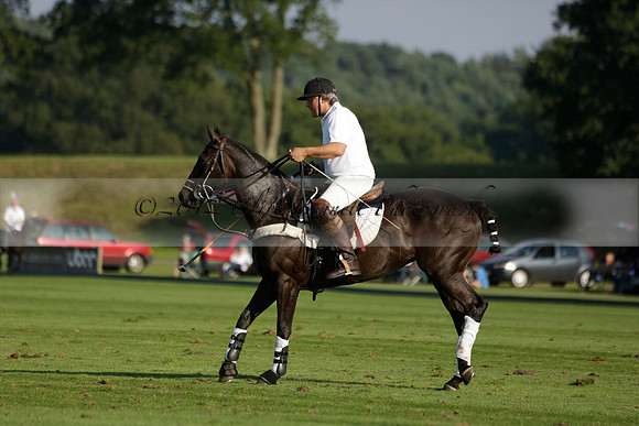 Pluma Negra (white) v Shoreline (black) in the Brecknock Cup Subsidiary final polo match played on Sunday 25 August 2013 at Cowdray Park Polo Club on Ambersham 1. 2013.10.12 www.polopictures.co.uk