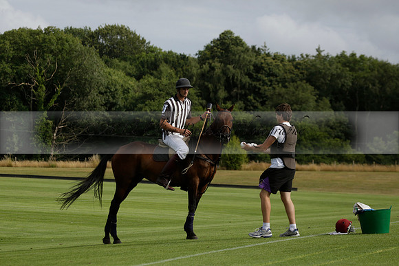 Jaeger Le Coultre (black)  v Wairakei Pastoral (white) in a Jaeger Le Coultre Holden White Cup polo match played on 29 July 2013 at Cowdray Park Polo Club on Brooksfieldwww.polopictures.co.uk
