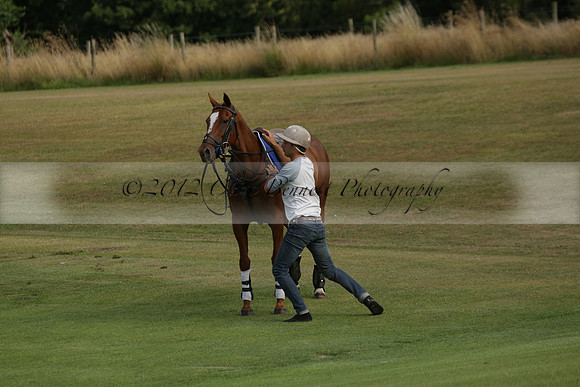 Jaeger Le Coultre (black)  v Wairakei Pastoral (white) in a Jaeger Le Coultre Holden White Cup polo match played on 29 July 2013 at Cowdray Park Polo Club on Brooksfieldwww.polopictures.co.uk