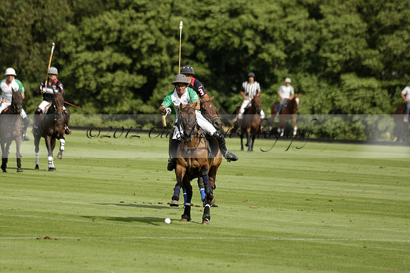 Jaeger Le Coultre (black)  v Wairakei Pastoral (white) in a Jaeger Le Coultre Holden White Cup polo match played on 29 July 2013 at Cowdray Park Polo Club on Brooksfieldwww.polopictures.co.uk