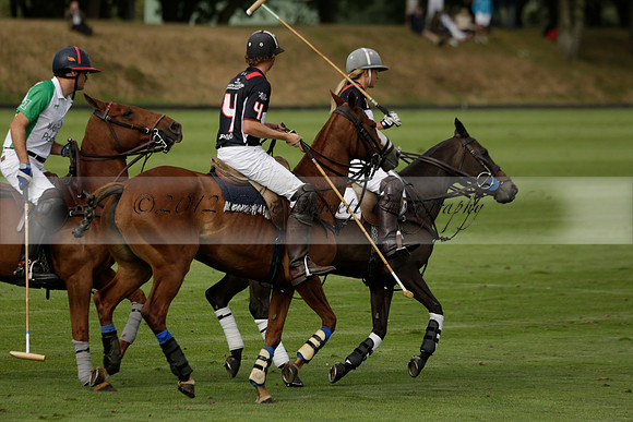 Jaeger Le Coultre (black)  v Wairakei Pastoral (white) in a Jaeger Le Coultre Holden White Cup polo match played on 29 July 2013 at Cowdray Park Polo Club on Brooksfieldwww.polopictures.co.uk
