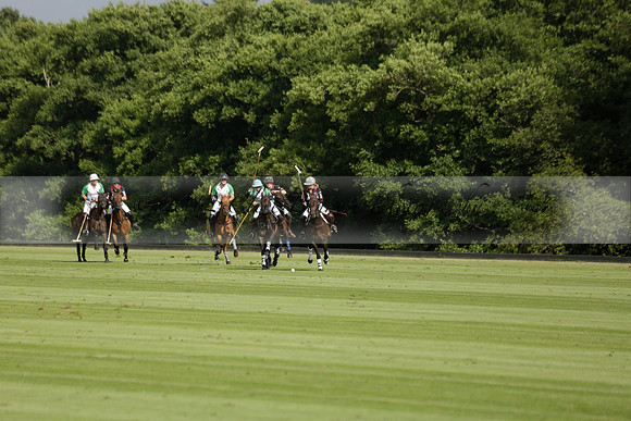 Jaeger Le Coultre (black)  v Wairakei Pastoral (white) in a Jaeger Le Coultre Holden White Cup polo match played on 29 July 2013 at Cowdray Park Polo Club on Brooksfieldwww.polopictures.co.uk
