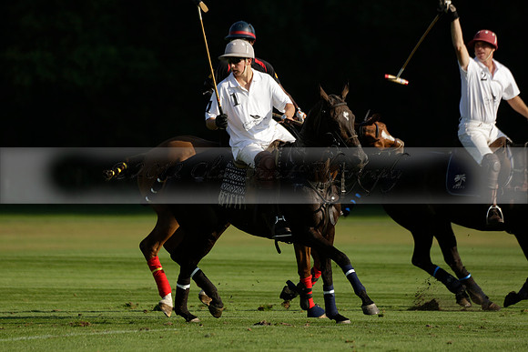 Pluma Negra (white) v Shoreline (black) in the Brecknock Cup Subsidiary final polo match played on Sunday 25 August 2013 at Cowdray Park Polo Club on Ambersham 1. 2013.10.12 www.polopictures.co.uk