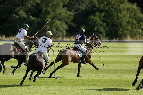 Pandas (white) v Home Farm (navy) in a Park House West Sussex Cup Polo match on Brooksfield at Cowdray Park Polo Club on Friday 30 August 2013. 2013.08.30 www.polopictures.co.uk