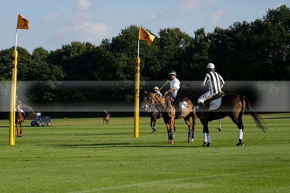 Pluma Negra (white) v Shoreline (black) in the Brecknock Cup Subsidiary final polo match played on Sunday 25 August 2013 at Cowdray Park Polo Club on Ambersham 1. 2013.10.12 www.polopictures.co.uk