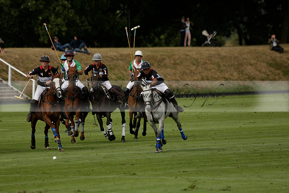 Jaeger Le Coultre (black)  v Wairakei Pastoral (white) in a Jaeger Le Coultre Holden White Cup polo match played on 29 July 2013 at Cowdray Park Polo Club on Brooksfieldwww.polopictures.co.uk