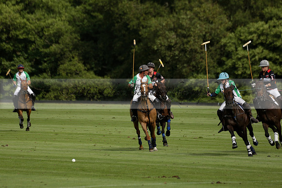 Jaeger Le Coultre (black)  v Wairakei Pastoral (white) in a Jaeger Le Coultre Holden White Cup polo match played on 29 July 2013 at Cowdray Park Polo Club on Brooksfieldwww.polopictures.co.uk