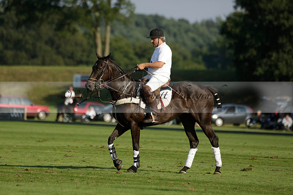 Pluma Negra (white) v Shoreline (black) in the Brecknock Cup Subsidiary final polo match played on Sunday 25 August 2013 at Cowdray Park Polo Club on Ambersham 1. 2013.10.12 www.polopictures.co.uk