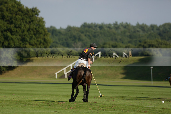 Pluma Negra (white) v Shoreline (black) in the Brecknock Cup Subsidiary final polo match played on Sunday 25 August 2013 at Cowdray Park Polo Club on Ambersham 1. 2013.10.12 www.polopictures.co.uk