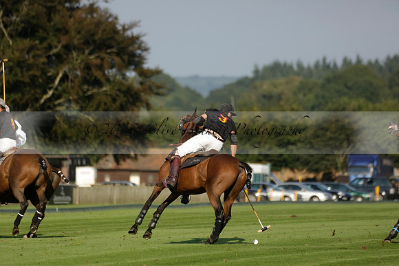 Pluma Negra (white) v Shoreline (black) in the Brecknock Cup Subsidiary final polo match played on Sunday 25 August 2013 at Cowdray Park Polo Club on Ambersham 1. 2013.10.12 www.polopictures.co.uk