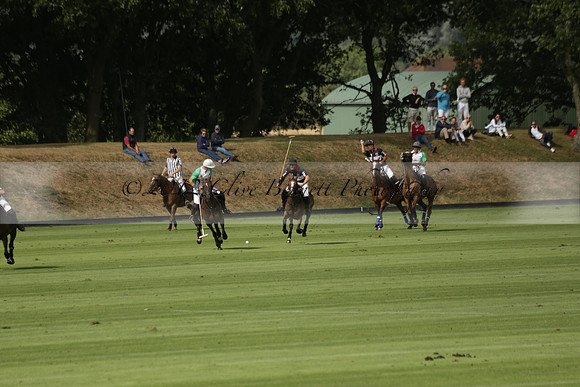 Jaeger Le Coultre (black)  v Wairakei Pastoral (white) in a Jaeger Le Coultre Holden White Cup polo match played on 29 July 2013 at Cowdray Park Polo Club on Brooksfieldwww.polopictures.co.uk