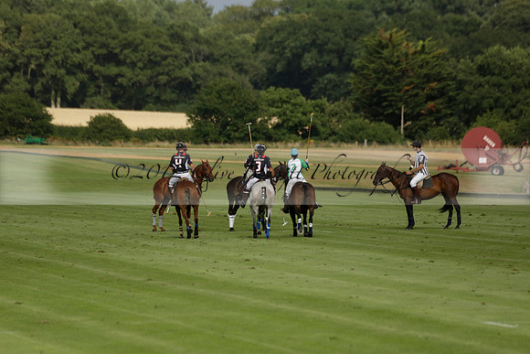 Jaeger Le Coultre (black)  v Wairakei Pastoral (white) in a Jaeger Le Coultre Holden White Cup polo match played on 29 July 2013 at Cowdray Park Polo Club on Brooksfieldwww.polopictures.co.uk
