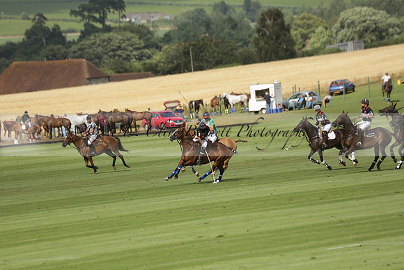 Jaeger Le Coultre (black)  v Wairakei Pastoral (white) in a Jaeger Le Coultre Holden White Cup polo match played on 29 July 2013 at Cowdray Park Polo Club on Brooksfieldwww.polopictures.co.uk