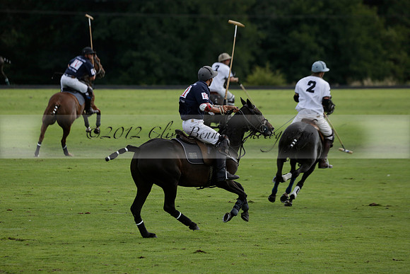 Pandas (white) v Home Farm (navy) in a Park House West Sussex Cup Polo match on Brooksfield at Cowdray Park Polo Club on Friday 30 August 2013. 2013.08.30 www.polopictures.co.uk
