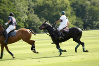 Pandas (white) v Home Farm (navy) in a Park House West Sussex Cup Polo match on Brooksfield at Cowdray Park Polo Club on Friday 30 August 2013. 2013.08.30 www.polopictures.co.uk