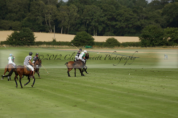 Jaeger Le Coultre (black)  v Wairakei Pastoral (white) in a Jaeger Le Coultre Holden White Cup polo match played on 29 July 2013 at Cowdray Park Polo Club on Brooksfieldwww.polopictures.co.uk