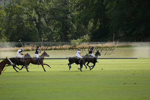 Pandas (white) v Home Farm (navy) in a Park House West Sussex Cup Polo match on Brooksfield at Cowdray Park Polo Club on Friday 30 August 2013. 2013.08.30 www.polopictures.co.uk
