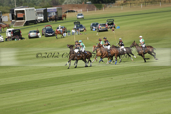 Jaeger Le Coultre (black)  v Wairakei Pastoral (white) in a Jaeger Le Coultre Holden White Cup polo match played on 29 July 2013 at Cowdray Park Polo Club on Brooksfieldwww.polopictures.co.uk
