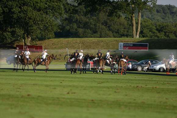 Pluma Negra (white) v Shoreline (black) in the Brecknock Cup Subsidiary final polo match played on Sunday 25 August 2013 at Cowdray Park Polo Club on Ambersham 1. 2013.10.12 www.polopictures.co.uk