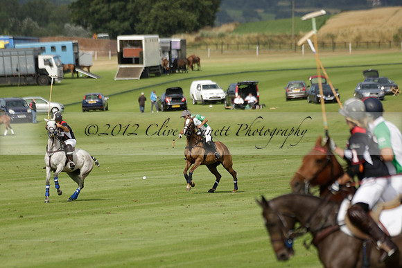 Jaeger Le Coultre (black)  v Wairakei Pastoral (white) in a Jaeger Le Coultre Holden White Cup polo match played on 29 July 2013 at Cowdray Park Polo Club on Brooksfieldwww.polopictures.co.uk