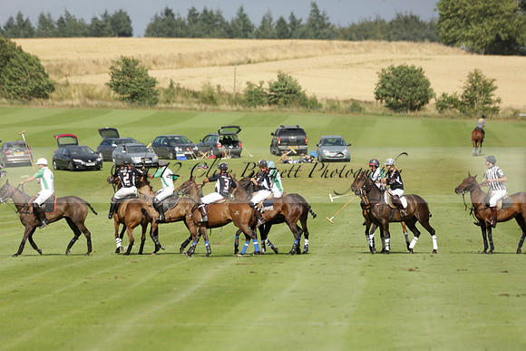 Jaeger Le Coultre (black)  v Wairakei Pastoral (white) in a Jaeger Le Coultre Holden White Cup polo match played on 29 July 2013 at Cowdray Park Polo Club on Brooksfieldwww.polopictures.co.uk