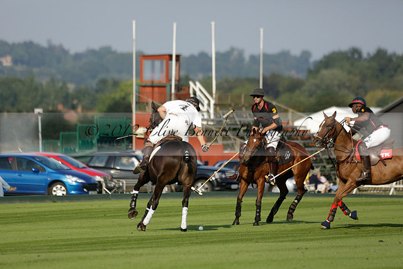 Pluma Negra (white) v Shoreline (black) in the Brecknock Cup Subsidiary final polo match played on Sunday 25 August 2013 at Cowdray Park Polo Club on Ambersham 1. 2013.10.12 www.polopictures.co.uk
