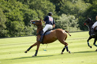 Pandas (white) v Home Farm (navy) in a Park House West Sussex Cup Polo match on Brooksfield at Cowdray Park Polo Club on Friday 30 August 2013. 2013.08.30 www.polopictures.co.uk