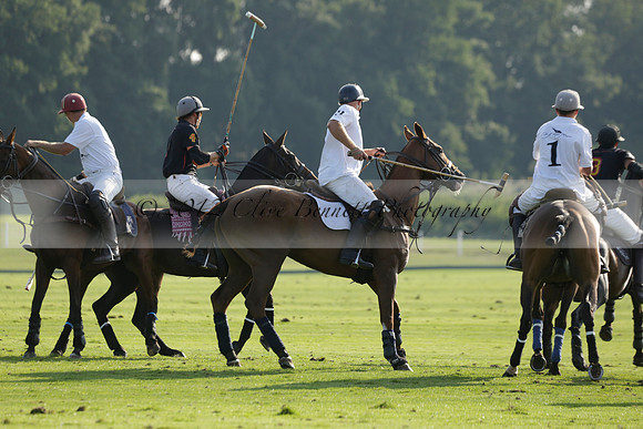 Pluma Negra (white) v Shoreline (black) in the Brecknock Cup Subsidiary final polo match played on Sunday 25 August 2013 at Cowdray Park Polo Club on Ambersham 1. 2013.10.12 www.polopictures.co.uk