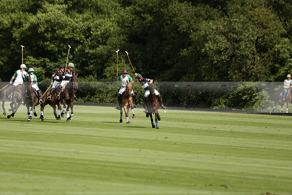Jaeger Le Coultre (black)  v Wairakei Pastoral (white) in a Jaeger Le Coultre Holden White Cup polo match played on 29 July 2013 at Cowdray Park Polo Club on Brooksfieldwww.polopictures.co.uk