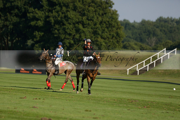 Pluma Negra (white) v Shoreline (black) in the Brecknock Cup Subsidiary final polo match played on Sunday 25 August 2013 at Cowdray Park Polo Club on Ambersham 1. 2013.10.12 www.polopictures.co.uk