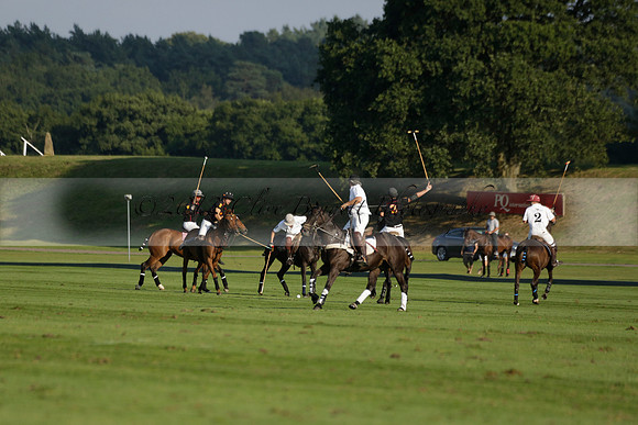 Pluma Negra (white) v Shoreline (black) in the Brecknock Cup Subsidiary final polo match played on Sunday 25 August 2013 at Cowdray Park Polo Club on Ambersham 1. 2013.10.12 www.polopictures.co.uk