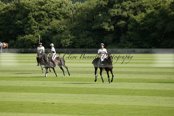 Pandas (white) v Home Farm (navy) in a Park House West Sussex Cup Polo match on Brooksfield at Cowdray Park Polo Club on Friday 30 August 2013. 2013.08.30 www.polopictures.co.uk