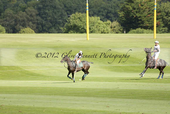 Pandas (white) v Home Farm (navy) in a Park House West Sussex Cup Polo match on Brooksfield at Cowdray Park Polo Club on Friday 30 August 2013. 2013.08.30 www.polopictures.co.uk