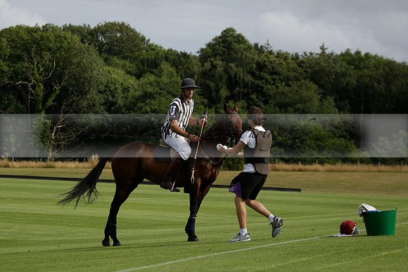 Jaeger Le Coultre (black)  v Wairakei Pastoral (white) in a Jaeger Le Coultre Holden White Cup polo match played on 29 July 2013 at Cowdray Park Polo Club on Brooksfieldwww.polopictures.co.uk