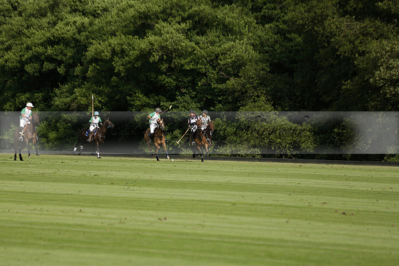 Jaeger Le Coultre (black)  v Wairakei Pastoral (white) in a Jaeger Le Coultre Holden White Cup polo match played on 29 July 2013 at Cowdray Park Polo Club on Brooksfieldwww.polopictures.co.uk