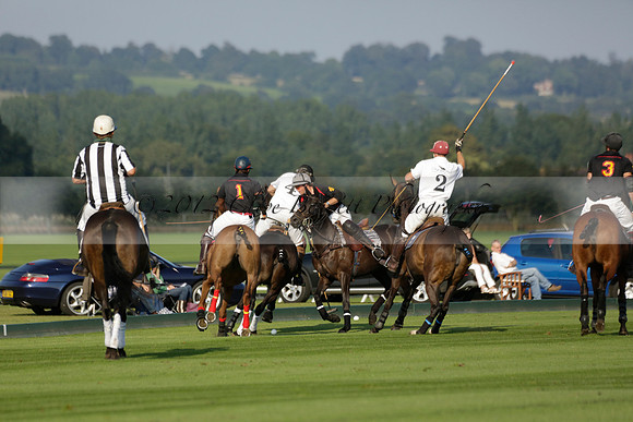 Pluma Negra (white) v Shoreline (black) in the Brecknock Cup Subsidiary final polo match played on Sunday 25 August 2013 at Cowdray Park Polo Club on Ambersham 1. 2013.10.12 www.polopictures.co.uk
