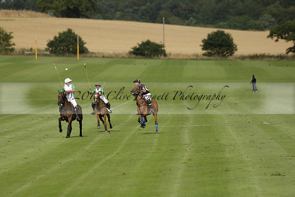Jaeger Le Coultre (black)  v Wairakei Pastoral (white) in a Jaeger Le Coultre Holden White Cup polo match played on 29 July 2013 at Cowdray Park Polo Club on Brooksfieldwww.polopictures.co.uk
