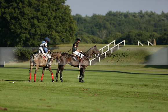 Pluma Negra (white) v Shoreline (black) in the Brecknock Cup Subsidiary final polo match played on Sunday 25 August 2013 at Cowdray Park Polo Club on Ambersham 1. 2013.10.12 www.polopictures.co.uk