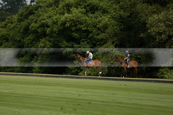 Jaeger Le Coultre (black)  v Wairakei Pastoral (white) in a Jaeger Le Coultre Holden White Cup polo match played on 29 July 2013 at Cowdray Park Polo Club on Brooksfieldwww.polopictures.co.uk